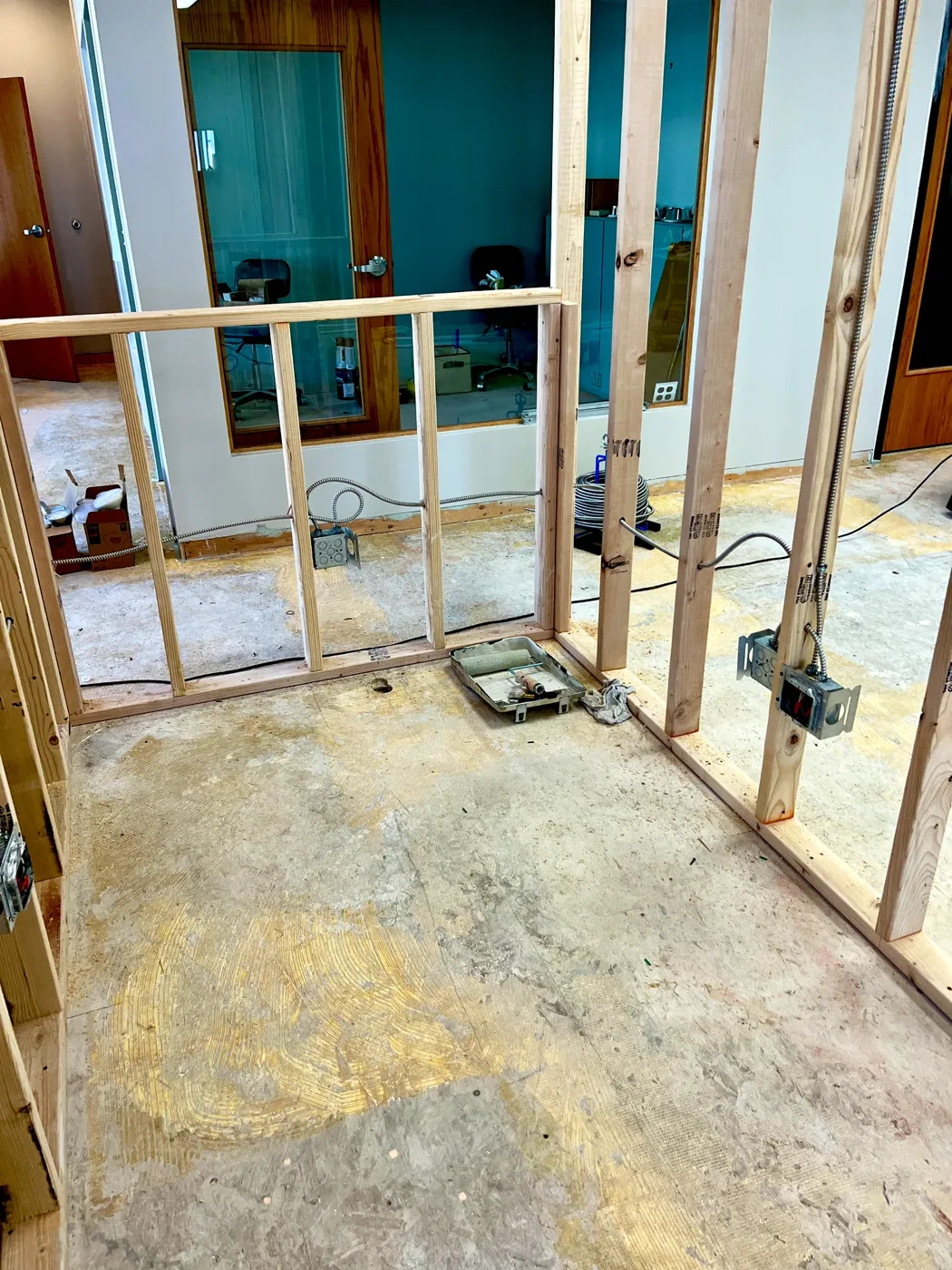 Framed walls with electrical boxes and conduit in a commercial build-out