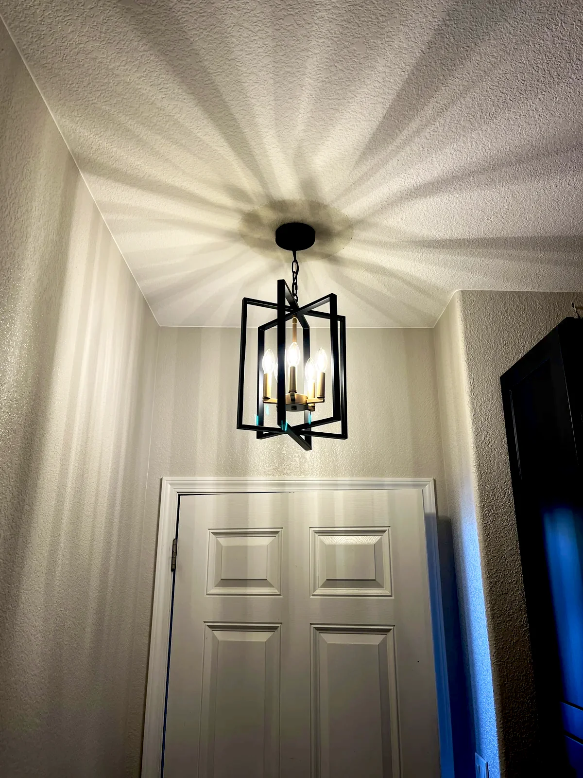 Lantern pendant light in a hallway